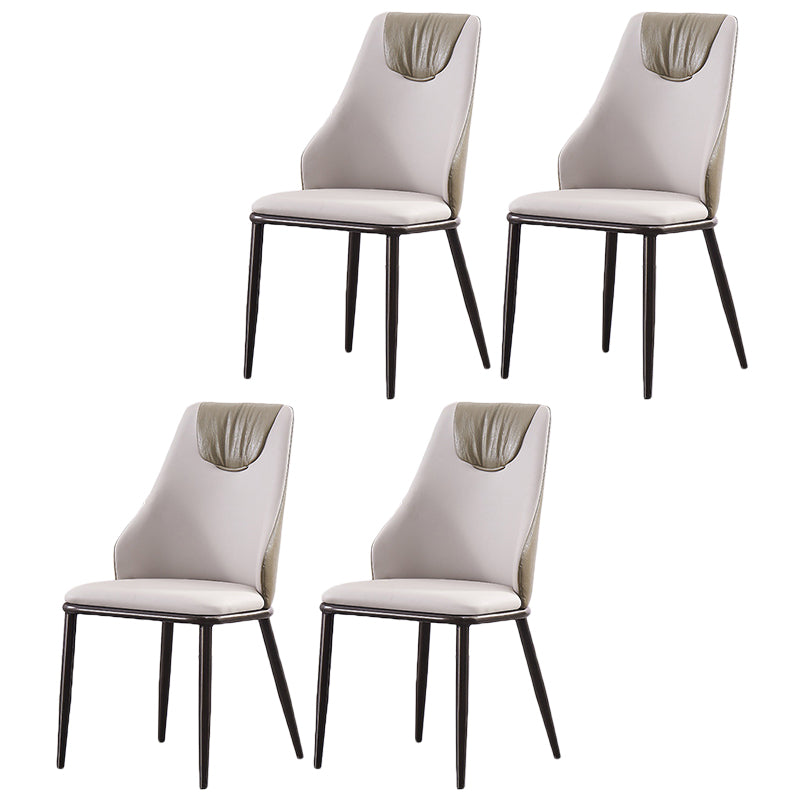 Chaises de salle à manger en cuir moderne en métal en métal avec des jambes noires