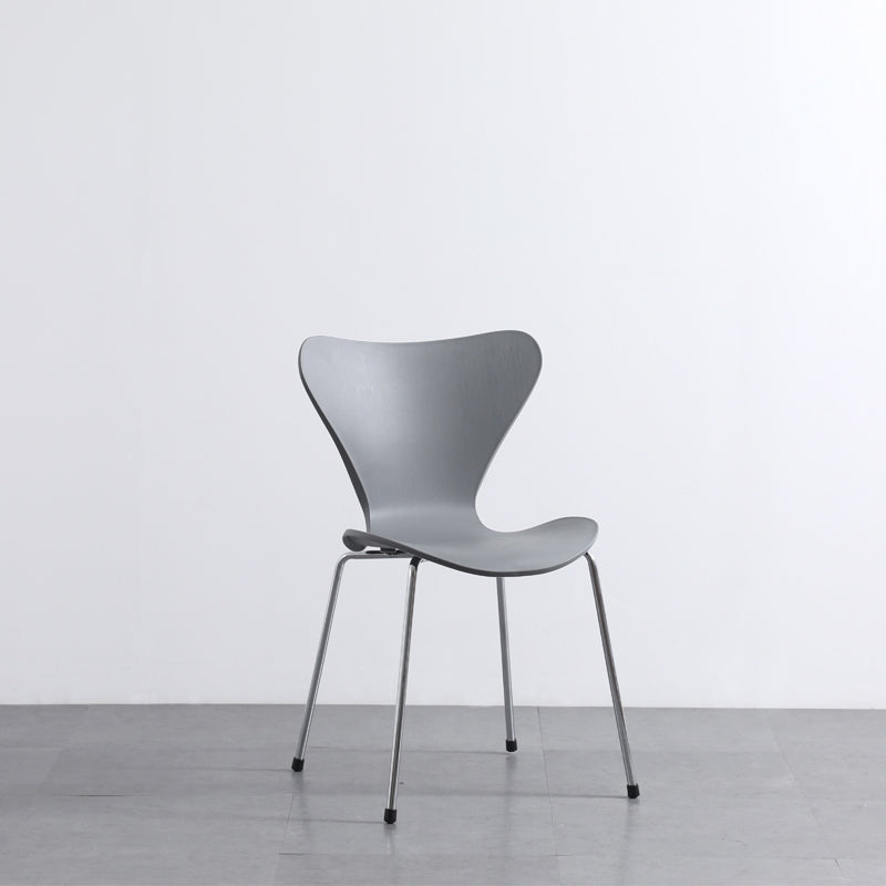 Sillas laterales sin brazos modernas con 4 patas de acabado negro sillas sólidas de plástico para uso doméstico