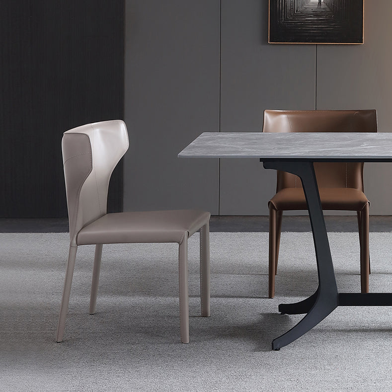 Sedia da pranzo in pelle contemporanea moderna sedia a wingback a colori puro