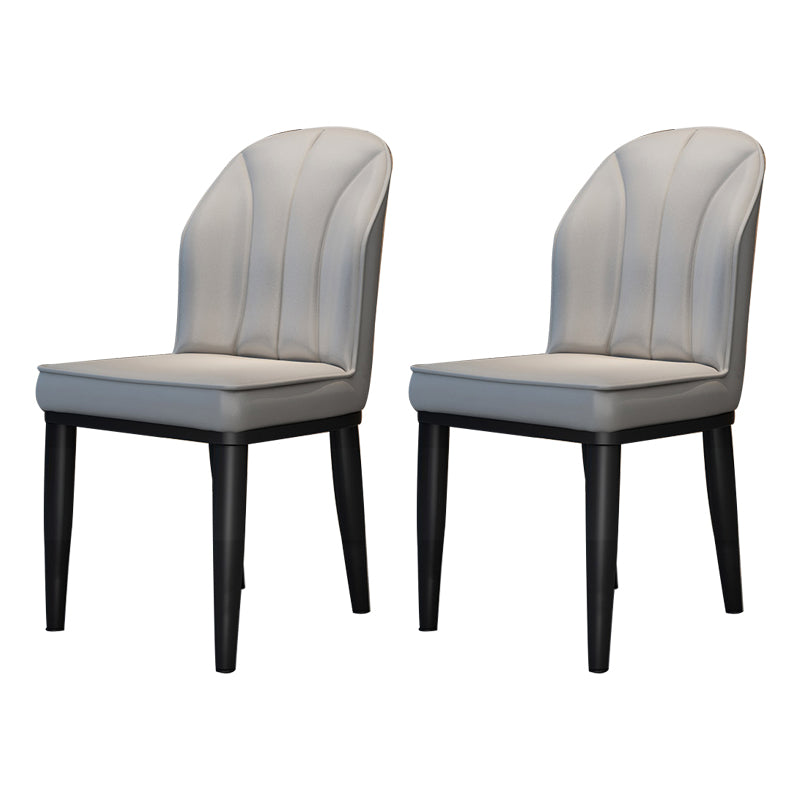 La salle à manger contemporaine en métal préside les chaises latérales à oreilles de finition métallique