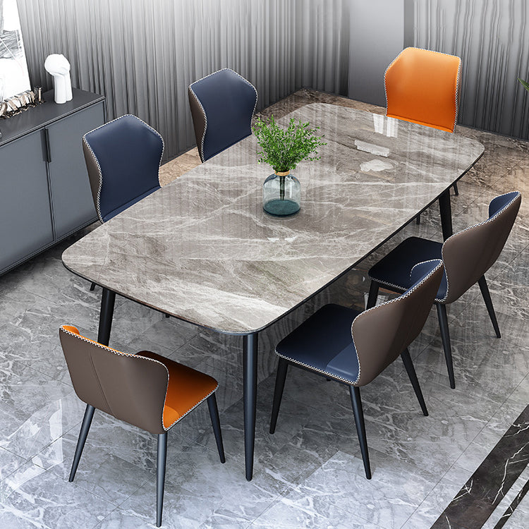 Contemporary Dining Set with Sintered Stone Dining Table and Cushioned Chairs