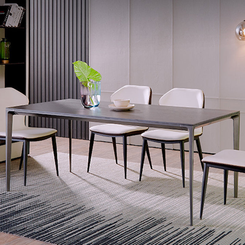 Simplicidad Mesa de comedor de piedra sinterizada Mesa rectangular con cuatro patas metálicas