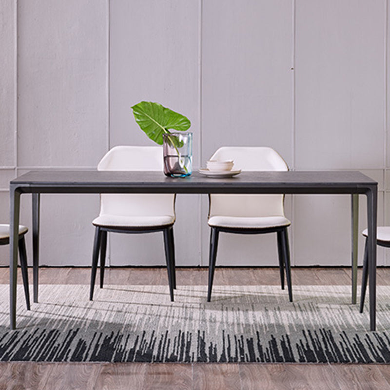 Simplicidad Mesa de comedor de piedra sinterizada Mesa rectangular con cuatro patas metálicas