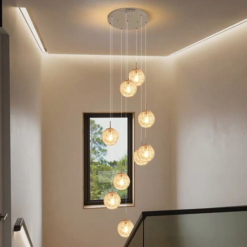 Lumière suspendue en argent dans la lampe suspendue du globe en acier inoxydable de style de luxe moderne pour les escaliers