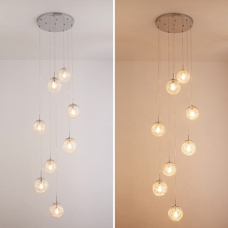Lumière suspendue en argent dans la lampe suspendue du globe en acier inoxydable de style de luxe moderne pour les escaliers