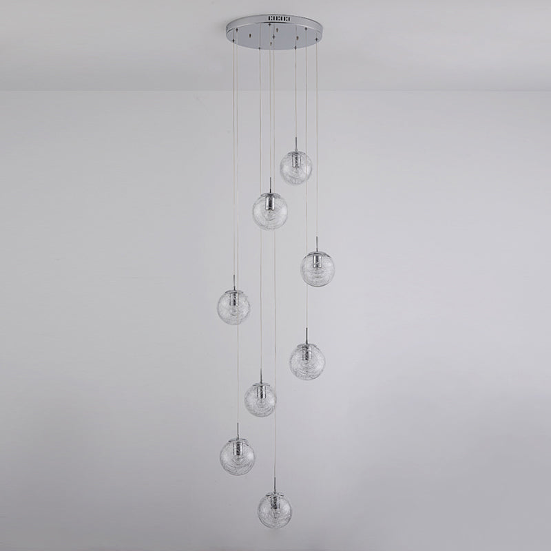 Lumière suspendue en argent dans la lampe suspendue du globe en acier inoxydable de style de luxe moderne pour les escaliers