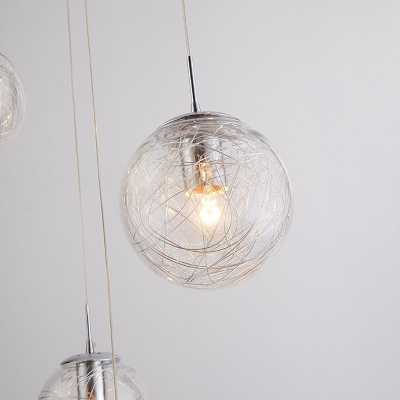 Lumière suspendue en argent dans la lampe suspendue du globe en acier inoxydable de style de luxe moderne pour les escaliers