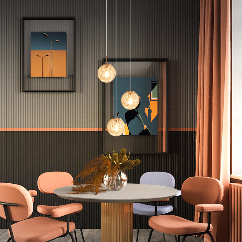 Lumière suspendue en argent dans la lampe suspendue du globe en acier inoxydable de style de luxe moderne pour les escaliers