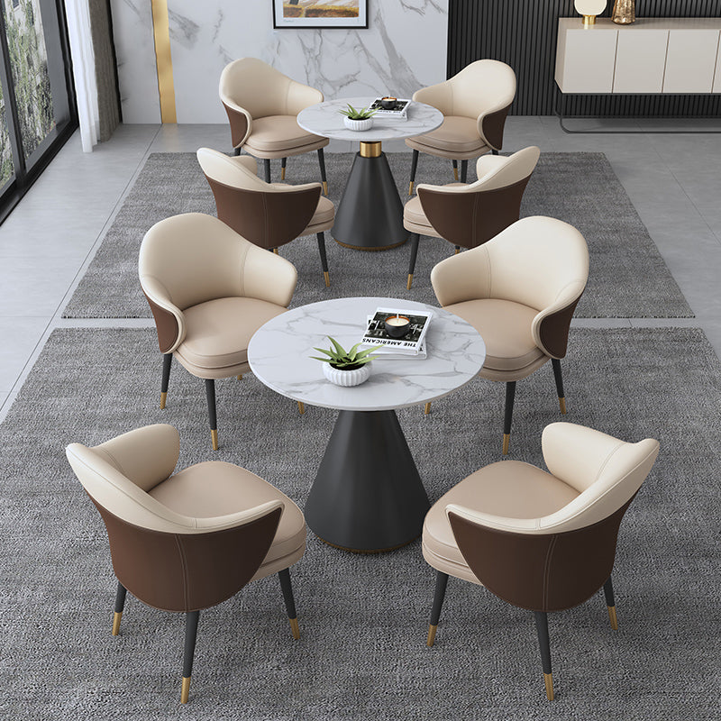 Eigentijdse stenen eettafel rond voetstuk huis keuken dinermeubilair