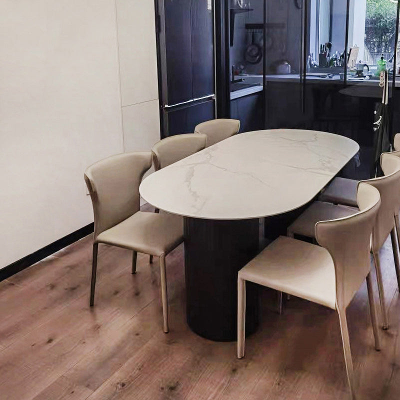 Table à manger en pierre fritrée de style moderne avec une double base de piédestal double