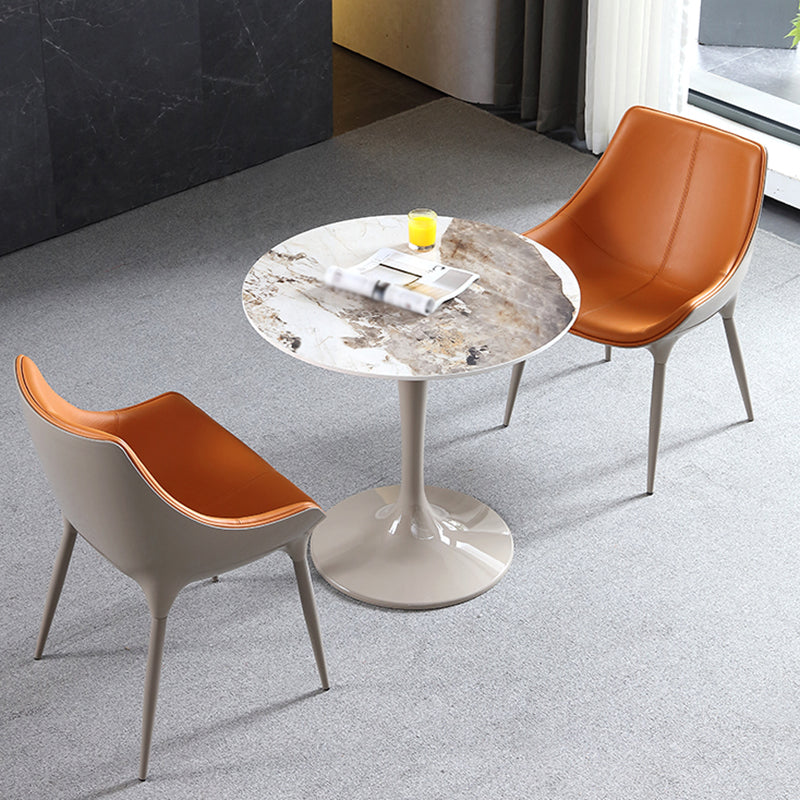 Ronde eigentijdse eettafel in bruintinten Vaste tafel van gesinterde steen
