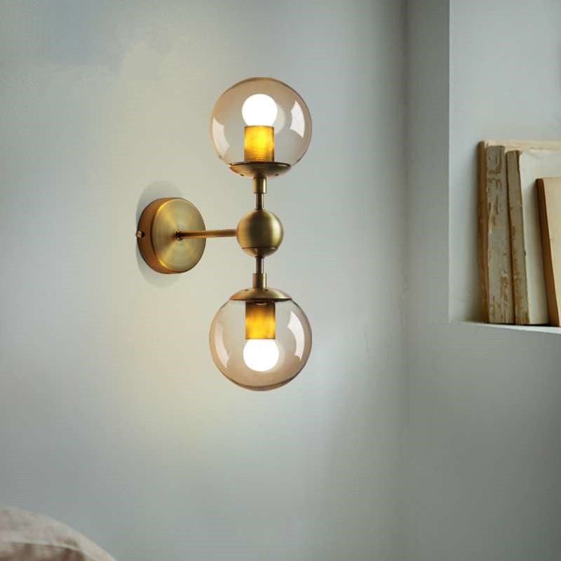 1/2-Head Global Wall Mount Light with Amber Glass Shade Modernist Wall Sconce Lighting in Gold for Bedroom