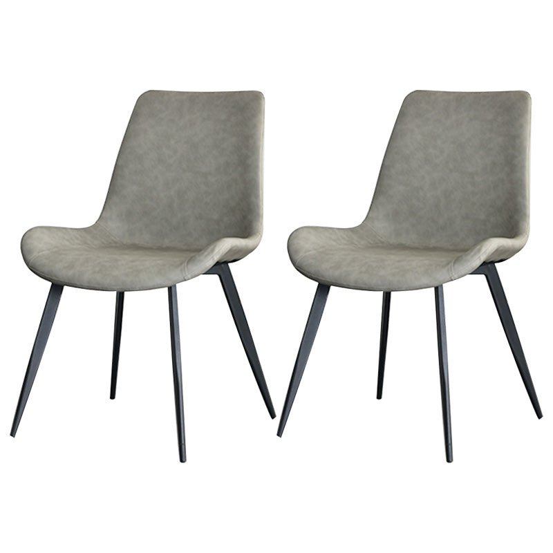 Chaises de salle à manger en simili cuir style contemporain avec 4 pieds finition noire, chaises sans accoudoirs