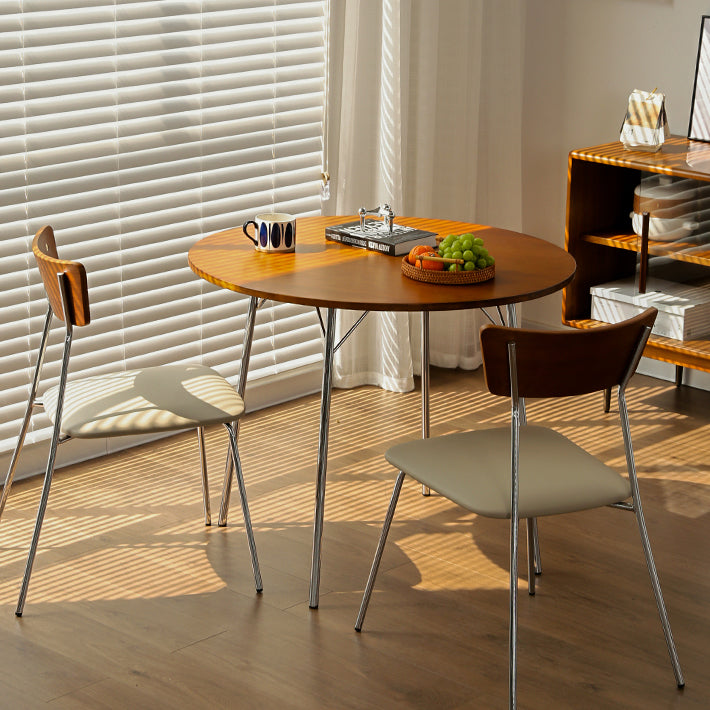Tavolo da pranzo rotondo contemporaneo Tavolo in legno massiccio con 4 gambe in metallo per la cena in cucina