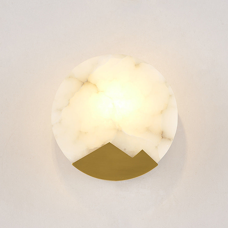 Éclairage mural en pierre en or