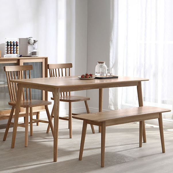 Eenvoudige bruine standaard eettafel vaste houten rechthoek eettafel met 4 potenbasis