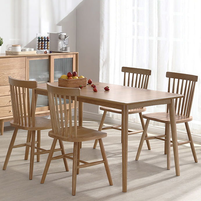 Eenvoudige bruine standaard eettafel vaste houten rechthoek eettafel met 4 potenbasis