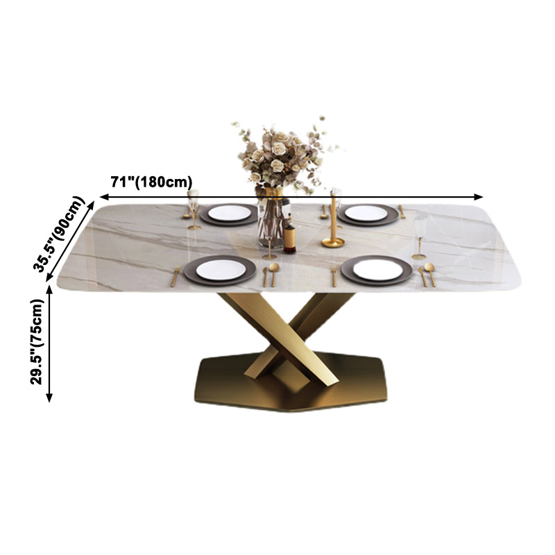 Mesa rectangular de piedra sinterizada con base de pedestal de metal dorado