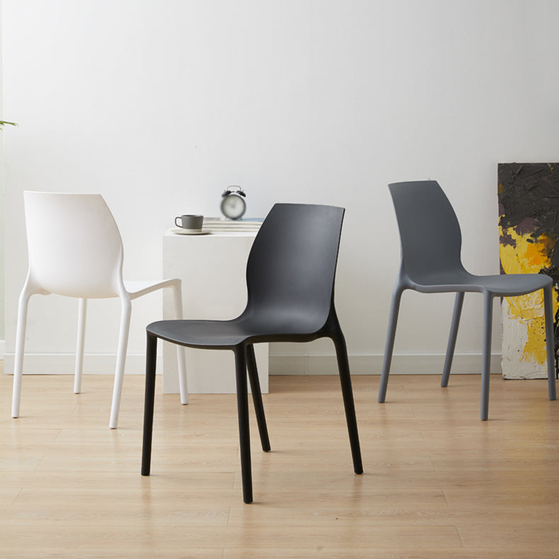 Scandinavian Armless Dining Chairs Plastic Indoor Stackable Solid Back Side Chair
