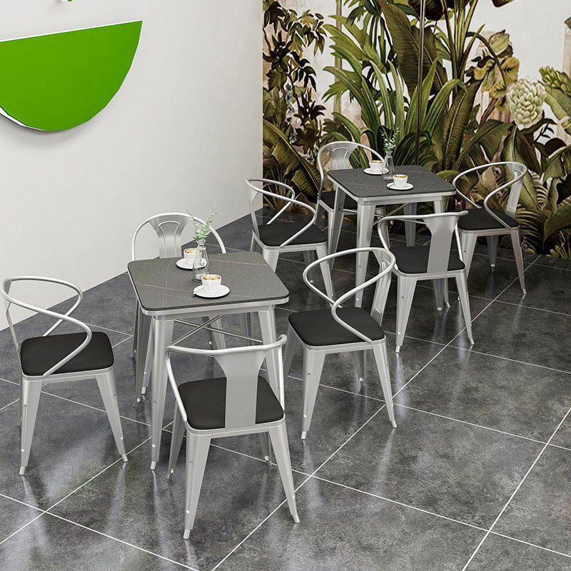 Mesa de comedor industrial Mesa de comedor de piedra sinterizada negra con base de trineo