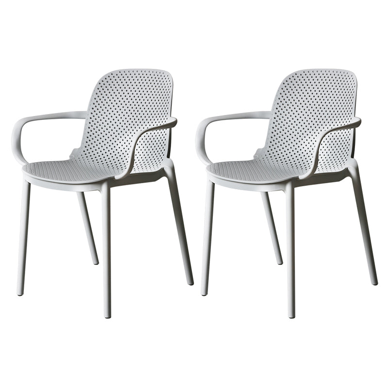 Sillón de comedor de plástico de estilo moderno Silla de comedor apilable multicolora