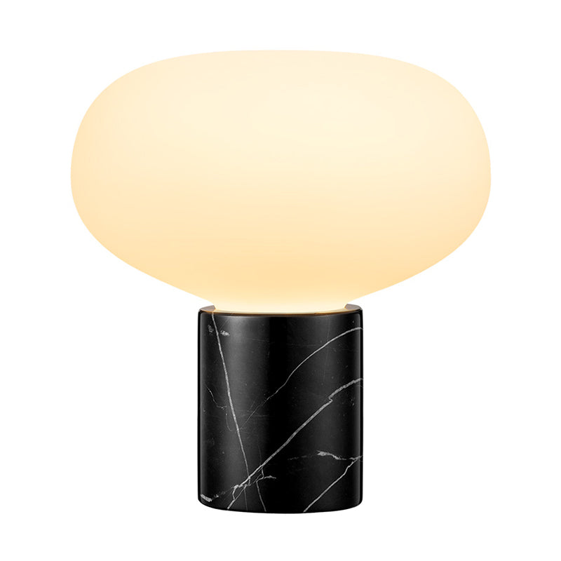 1 tête de table ovale claire moderne verre blanc petite lampe de bureau en noir avec base en marbre