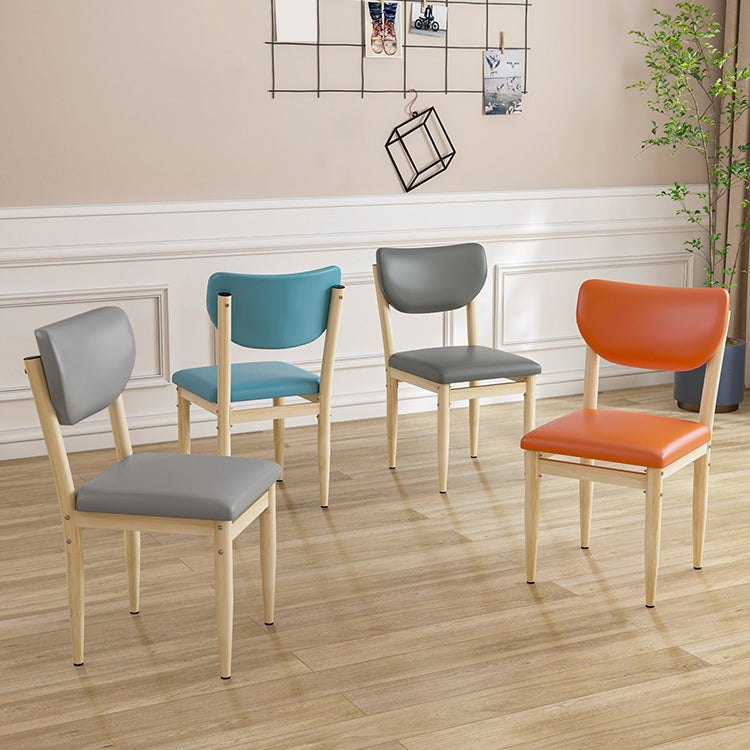 Silla lateral casera escandinava tapizada con respaldo abierto Silla de comedor individual de metal