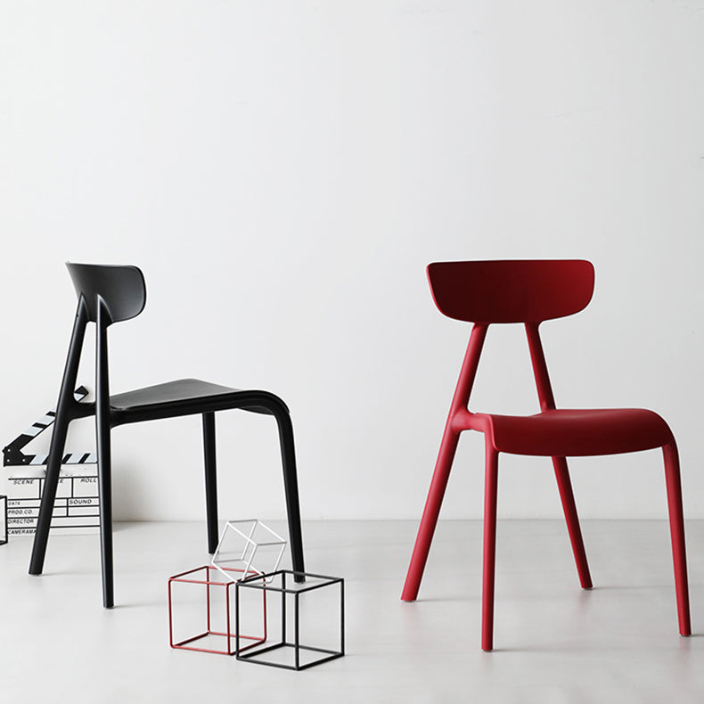 Minimalistische stijl Plastic armloze stoel Open achterste Dining zijstoel voor thuisgebruik