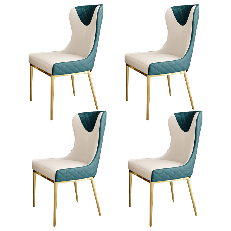 Silla sin brazos tapizada de cuero con respaldo lateral y patas de metal