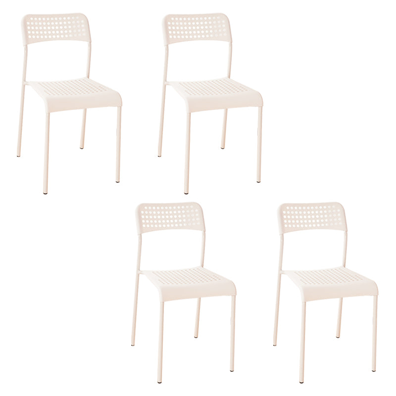El comedor contemporáneo del metal preside la parte posterior abierta plástica que cena la silla sin brazos lateral