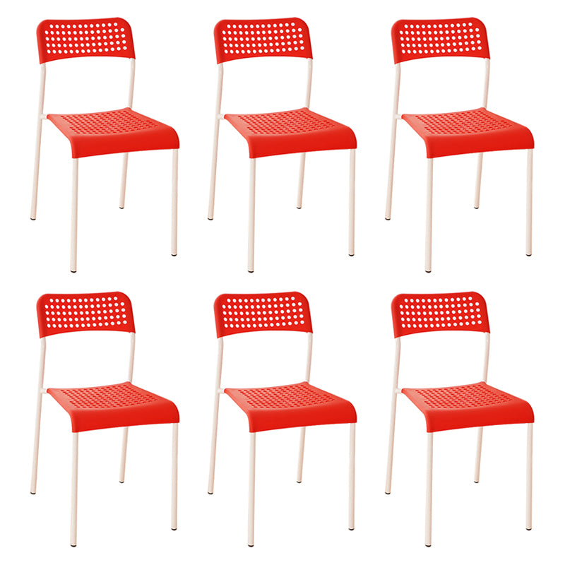 El comedor contemporáneo del metal preside la parte posterior abierta plástica que cena la silla sin brazos lateral