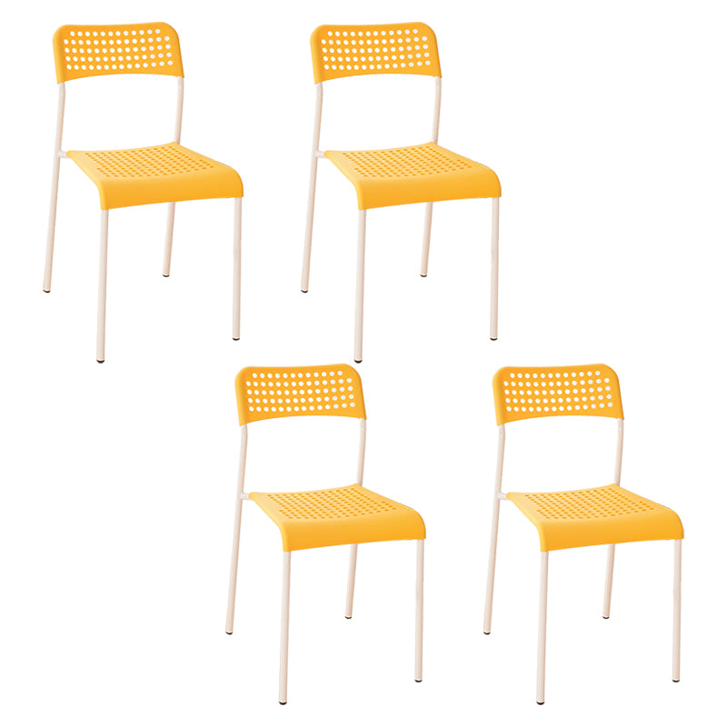 El comedor contemporáneo del metal preside la parte posterior abierta plástica que cena la silla sin brazos lateral