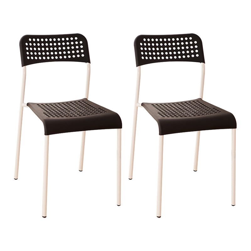 El comedor contemporáneo del metal preside la parte posterior abierta plástica que cena la silla sin brazos lateral