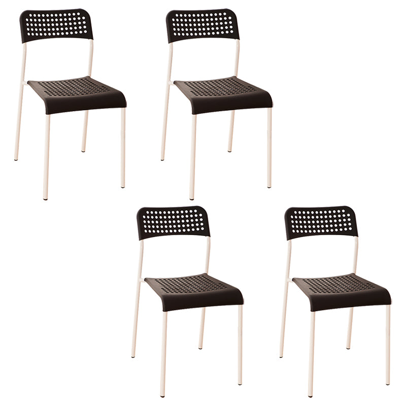 El comedor contemporáneo del metal preside la parte posterior abierta plástica que cena la silla sin brazos lateral