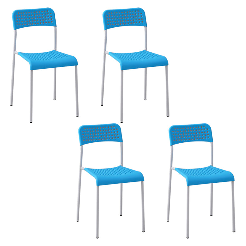 El comedor contemporáneo del metal preside la parte posterior abierta plástica que cena la silla sin brazos lateral