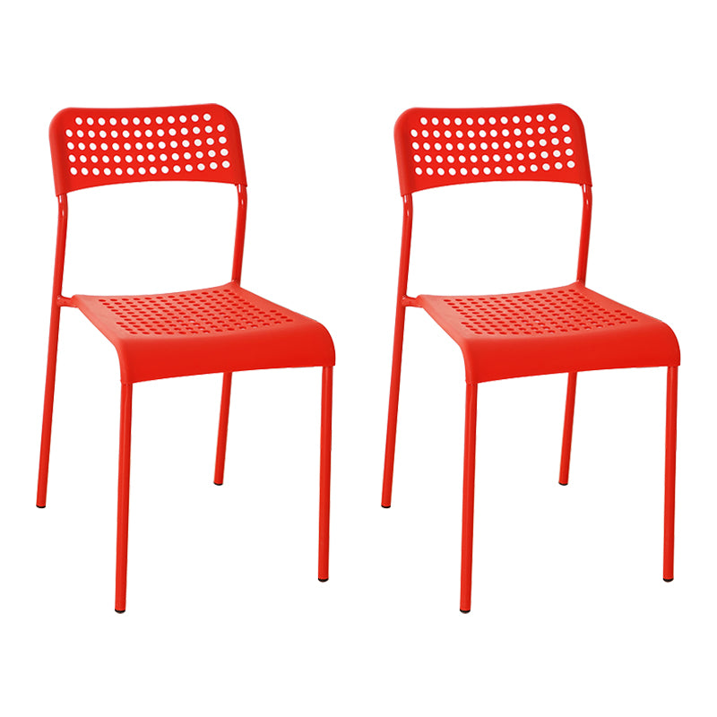 El comedor contemporáneo del metal preside la parte posterior abierta plástica que cena la silla sin brazos lateral