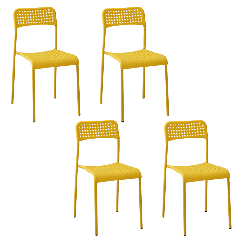 El comedor contemporáneo del metal preside la parte posterior abierta plástica que cena la silla sin brazos lateral