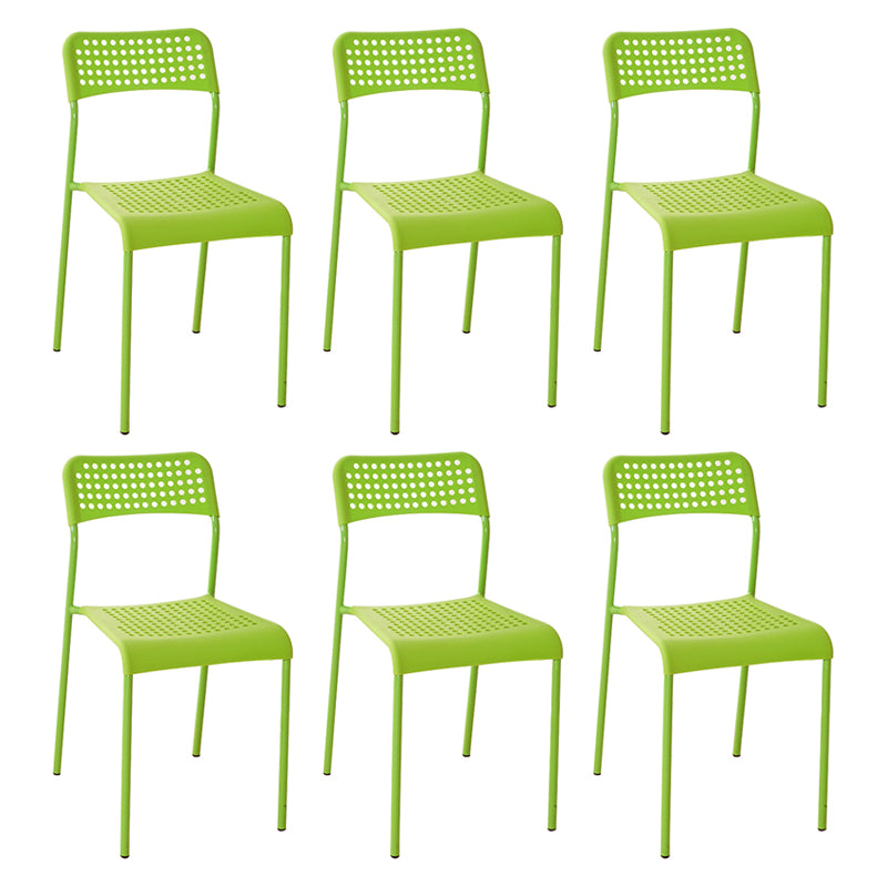 El comedor contemporáneo del metal preside la parte posterior abierta plástica que cena la silla sin brazos lateral