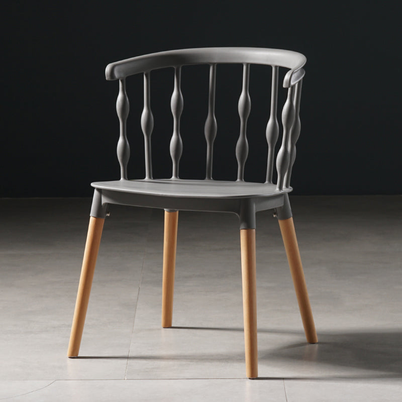 Sillas de comedor estilo moderno Sillas sin brazos de plástico con patas de madera