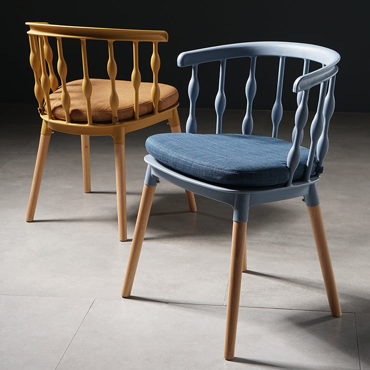 Sillas de comedor estilo moderno Sillas sin brazos de plástico con patas de madera