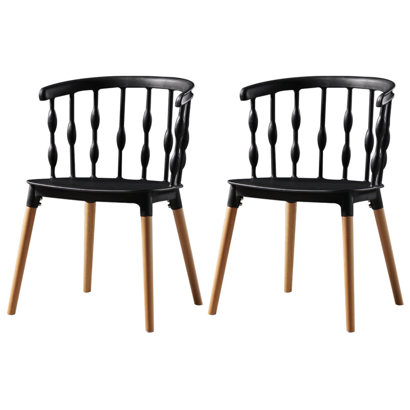 Sillas de comedor estilo moderno Sillas sin brazos de plástico con patas de madera