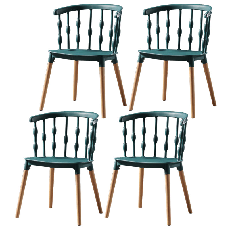 Sillas de comedor estilo moderno Sillas sin brazos de plástico con patas de madera