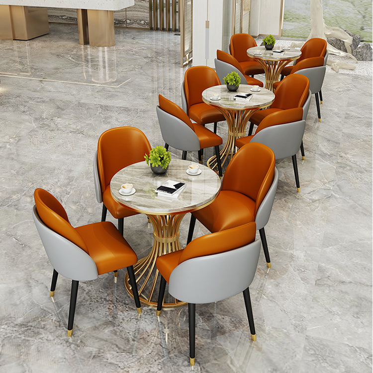 Eenvoudige stijl thuis gesinterde stenen eettafel ronde vormtafel met metalen voetstukbasis