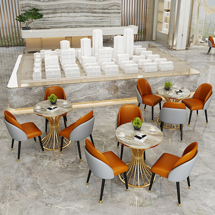 Eenvoudige stijl thuis gesinterde stenen eettafel ronde vormtafel met metalen voetstukbasis