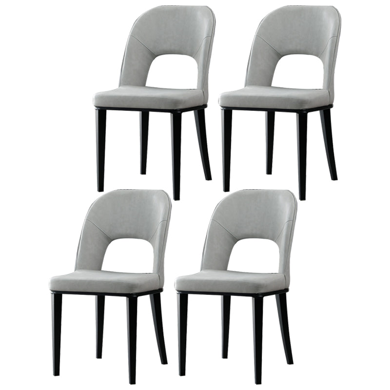 Silla de comedor contemporánea con acabado mate, respaldo abierto de cuero, silla lateral