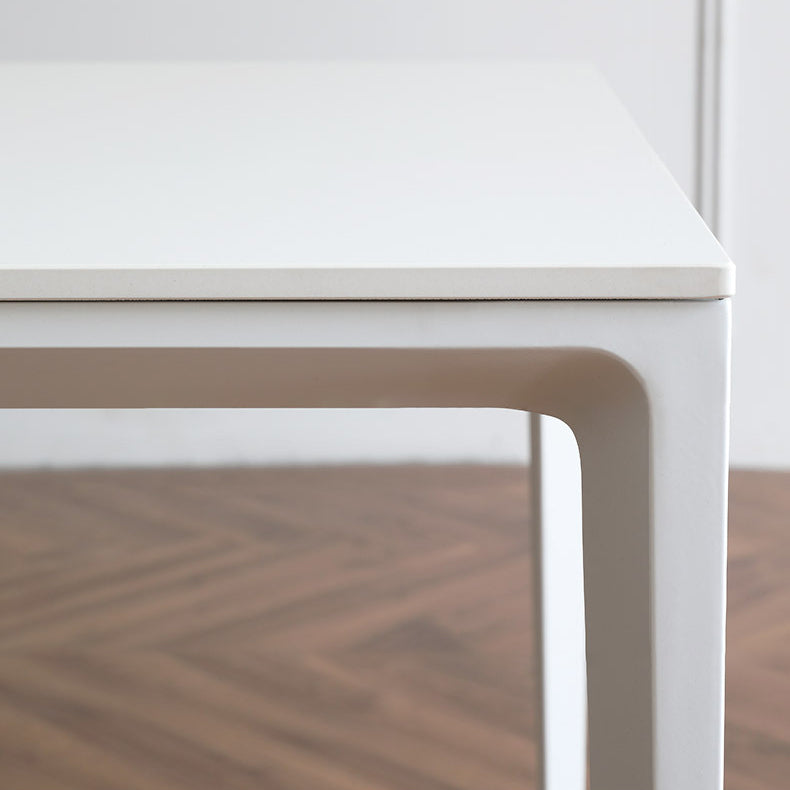 Table à manger rectangulaire contemporaine en métal blanc table de pierre fritrée avec des jambes métalliques