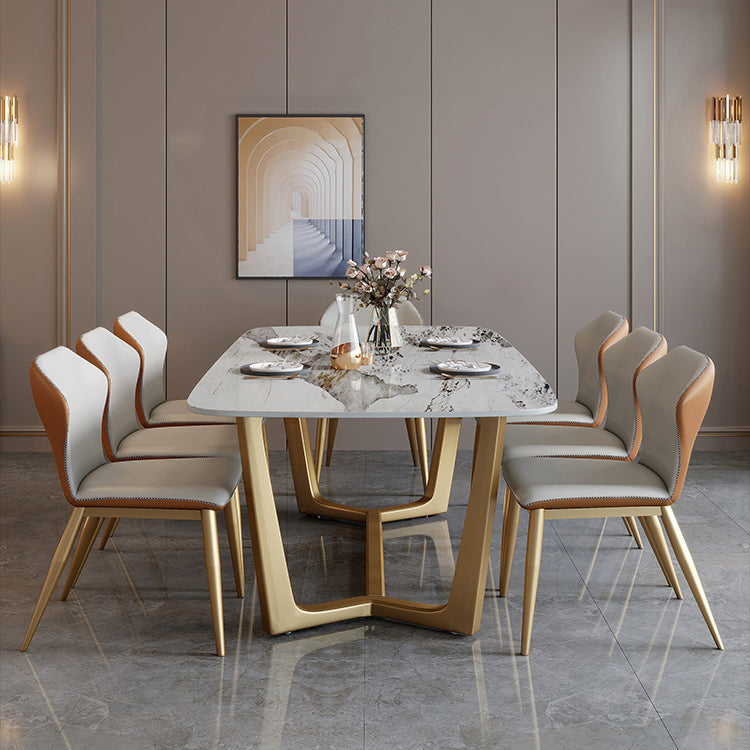 Mesa de comedor de piedra sinterizada de lujo tradicional mesa rectángulo con base de caballete dorado