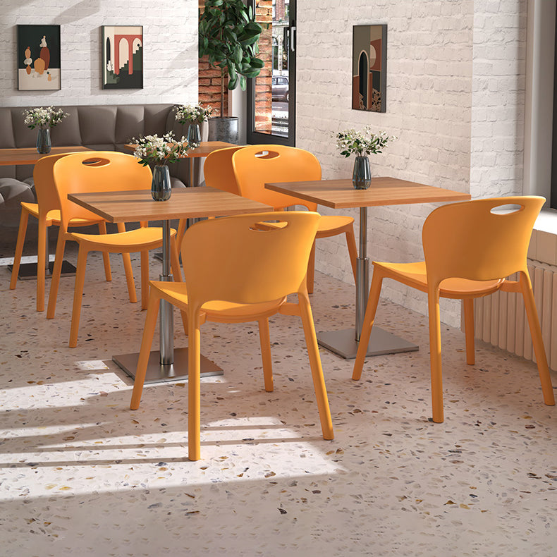 El comedor plástico contemporáneo preside la parte posterior abierta sin brazos que cena la silla lateral para el uso en el hogar