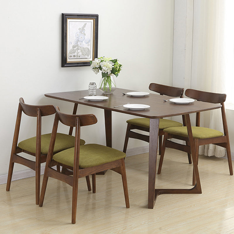 Silla de comedor escandinava de lino con respaldo abierto y acabado mate