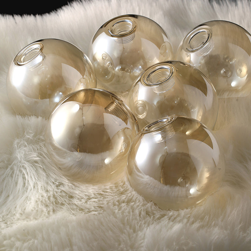 Zeitgenössische Anhänger Lichter Sphere Glass Island Beleuchtungsideen in Gold